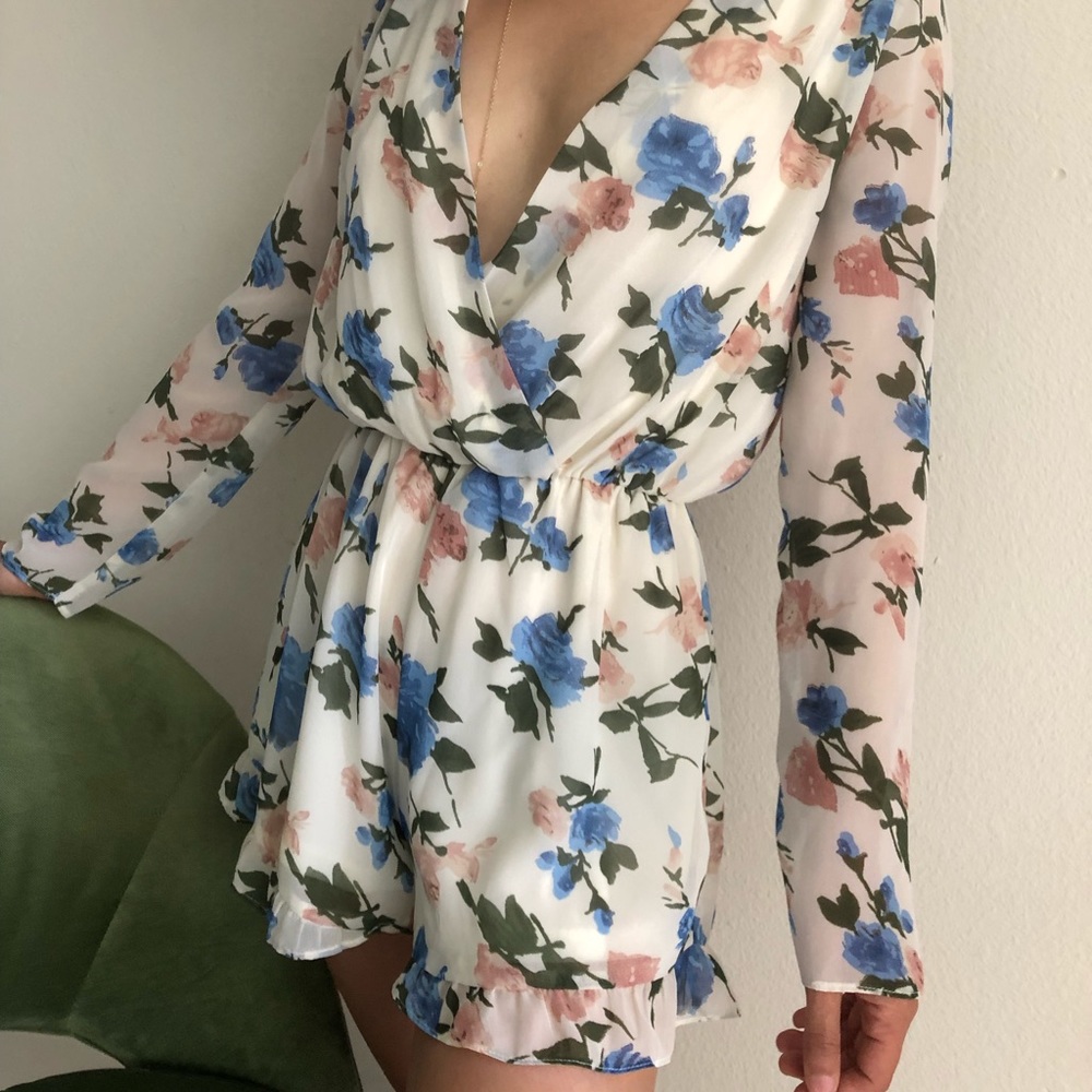 Floral Foreign Exchange Romper size small